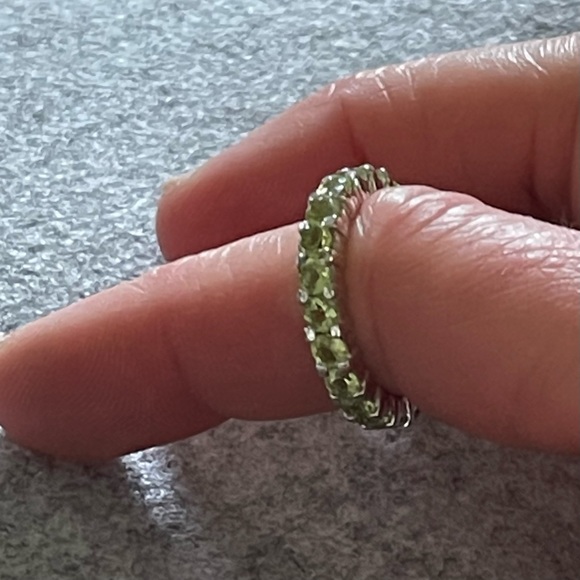 925 Sterling silver eternity ring band, possibly peridot.